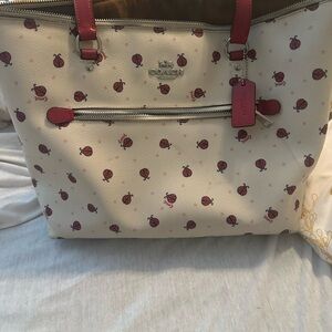 Coach ladybug tote. Tan inside.
